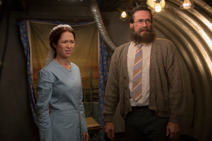 Ellie Kemper as Kimmy Schmidt and Jon Hamm as Reverend Richard Wayne Gary Wayne in "Unbreakable Kimmy Schmidt." 