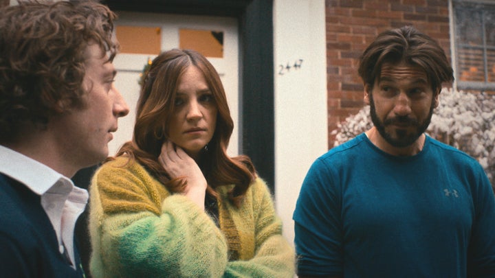 From left to right: White as Carmy, Abby Elliott as Natalie "Sugar" Berzatto and Bernthal as Mikey in "The Bear."