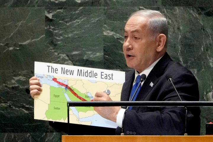 Israel's Prime Minister Benjamin Netanyahu uses a red marker on a map as he addresses the 78th session of the United Nations General Assembly, Friday, Sept. 22, 2023. 