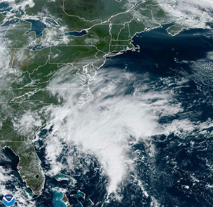 This Saturday, Sept. 23, 2023, 8:16 am EST satellite image provided by the National Oceanic and Atmospheric Administration shows Tropical Storm Ophelia making landfall in North Carolina.