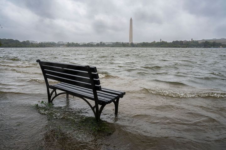The Tidal Basin in Washington overflows the banks with the rain from Tropical Storm Ophelia, Saturday, Sept. 23, 2023.