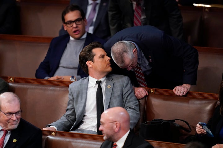 Rep. Matt Gaetz, R-Fla., talks with Rep. Matt Rosendale, R-Mont., before the 14th vote in the House chamber as the House meets for the fourth day to elect a speaker and convene the 118th Congress in Washington, Friday, Jan. 6, 2023. (AP Photo/Alex Brandon)