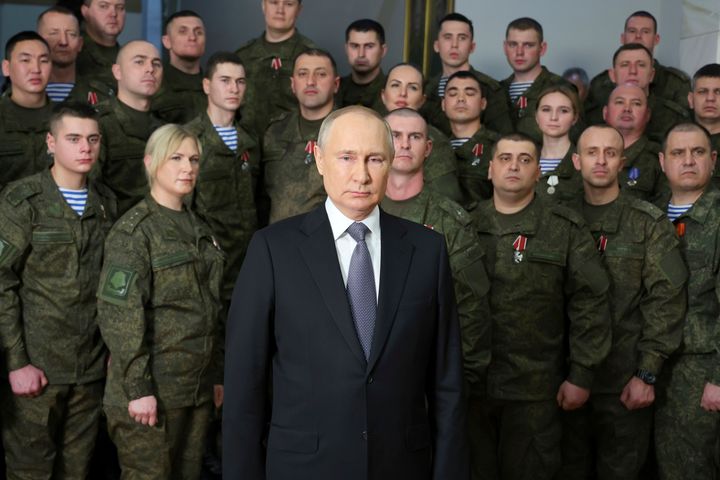 Russian president Vladimir Putin pictured with Russian troops.