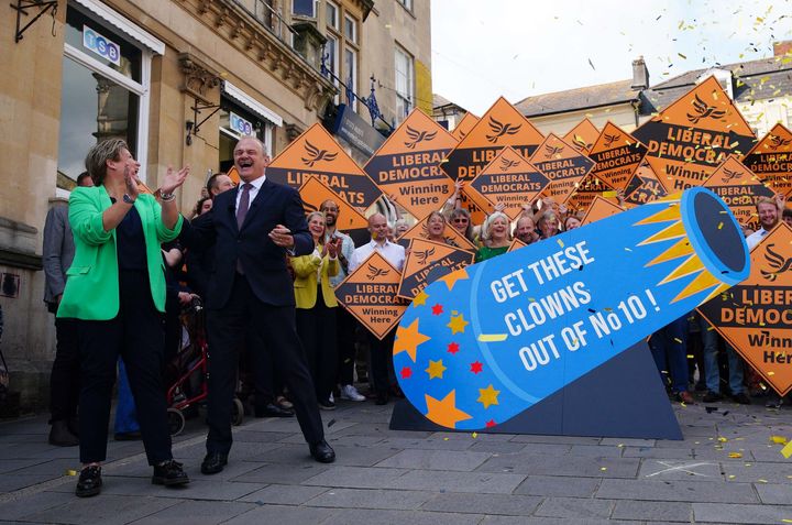 Ed Davey celebrates with a novelty cannon after winning the Somerton and Frome by-election in July.