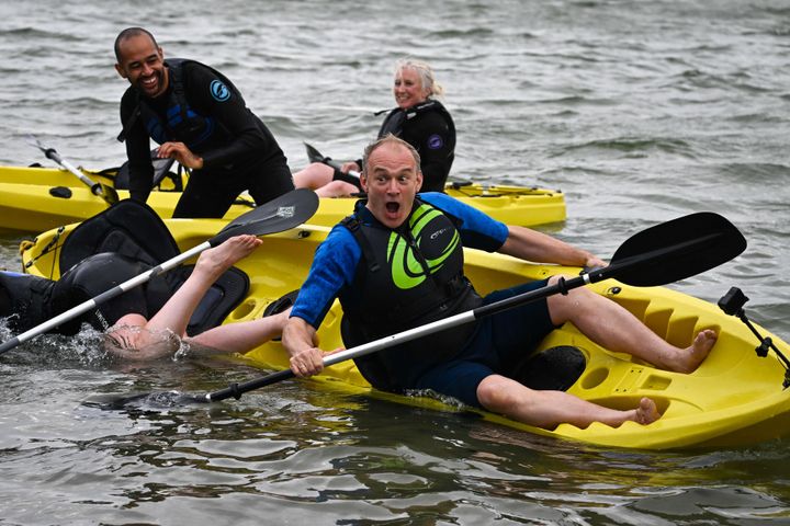 Ed Davey gets tipped into the water after kayaking in Bournemouth during the Lib Dem conference in the city (Photo by Finnbarr Webster/Getty Images)