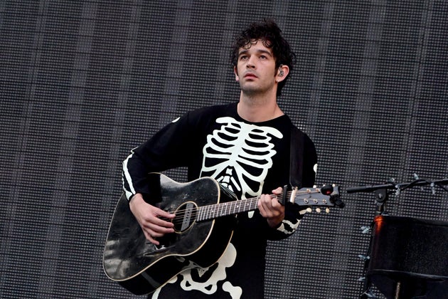Matty Healy on stage during Phoebe Bridgers' support set on the Eras tour in May 2023