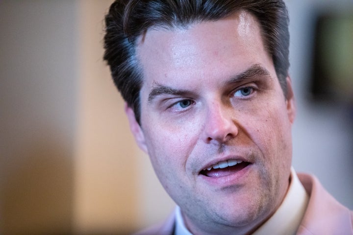 Rep. Matt Gaetz (R-Fla.) speaks to reporters in the Capitol building Thursday. Gaetz was one of a handful of Republicans holding up House GOP leaders' plans to hold votes on a defense funding bill.