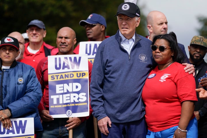 President Joe Biden joins striking United Auto Workers on the picket line, in Van Buren Township, Mich. (AP Photo/Evan Vucci)