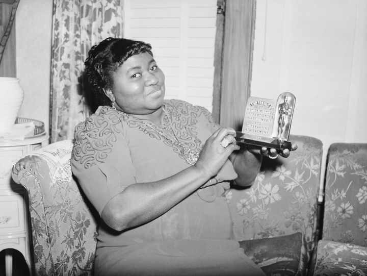 Hattie McDaniel poses with her Oscar plaque for Best Supporting Actress for "Gone With The Wind." The Academy of Motion Pictures and Sciences will replace her long-missing trophy with a new one.