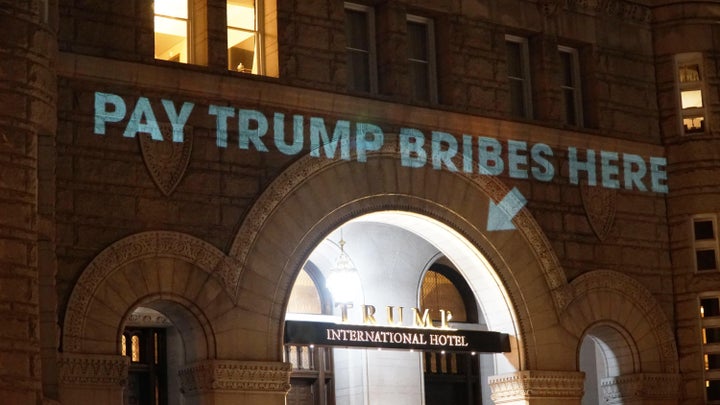 Artist Robin Bell projects messages onto the Trump International Hotel in Washington, D.C., in 2017.