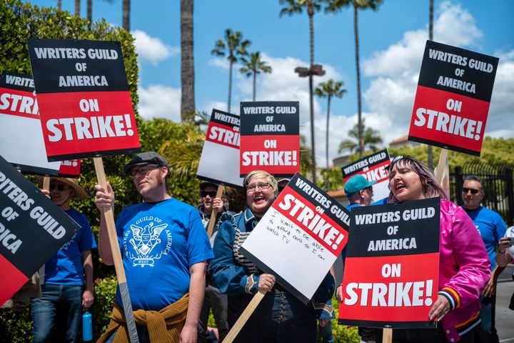 People picketing Paramount Pictures on the first day of the writers strike in May