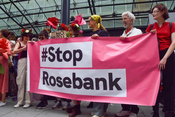 Protesters hold a 'Stop Rosebank' banner during the demonstration outside the Department for Energy Security and Net Zero.