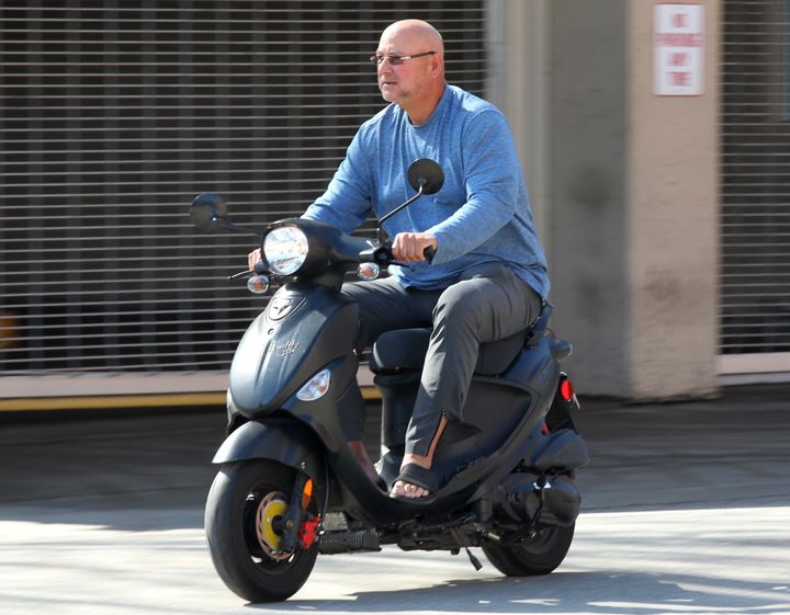 Cleveland Indians manager Terry Francona leaves Progressive Field in Cleveland on his scooter on the scheduled day of the Indians' home opening baseball game on March 26, 2020. Slowed by major health issues in recent years, the personable, popular Francona may be stepping away, but not before leaving a lasting imprint as a manager and as one of the game's most beloved figures. (John Kuntz/Cleveland.com via AP)