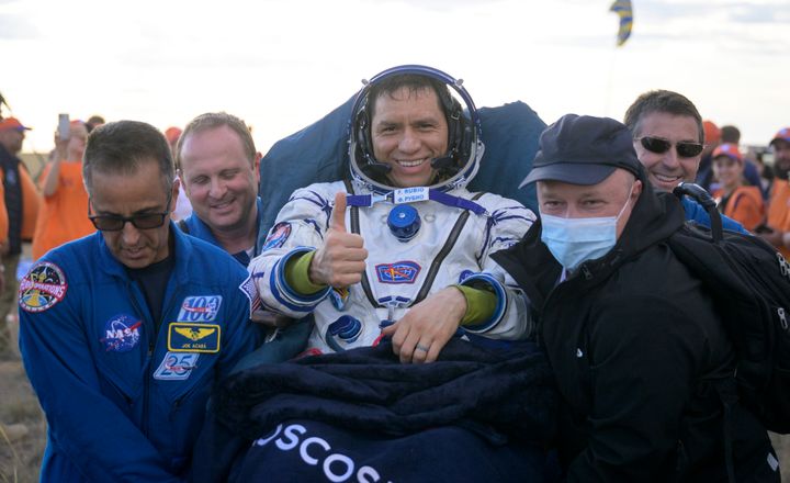 NASA astronaut Frank Rubio is carried to the medical tent after landing on Earth on Wednesday.