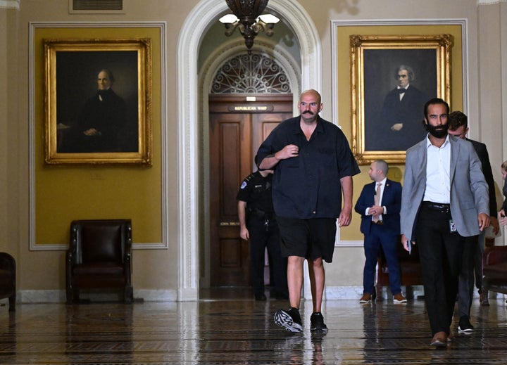 Sen. John Fetterman, seen here at the U.S. Capitol on Sept. 21, is often seen in the Senate wearing shorts or hooded sweatshirts.