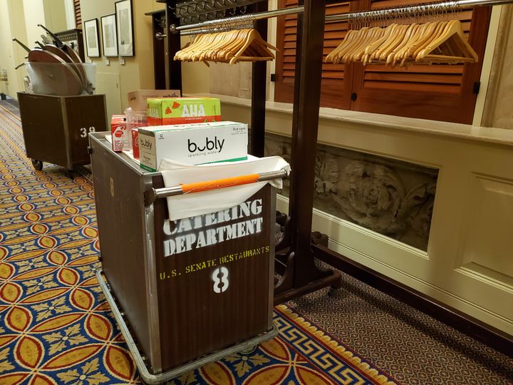 A catering cart sits in a hallway in the U.S. Capitol near the room where Senate Democrats have their weekly party lunches.