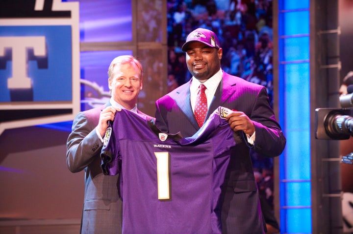 This file photo shows Michael Oher with NFL commissioner Roger Goodell at Radio City Music Hall. (Photo by David Bergman /Sports Illustrated via Getty Images)