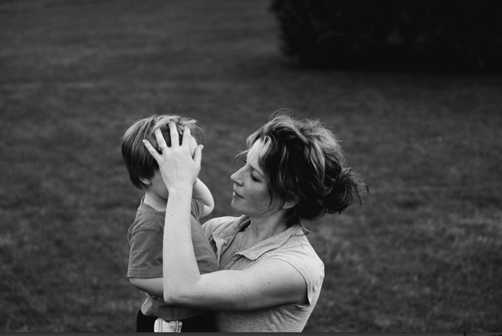 "I wanted to be the fun mum I saw on Instagram who had the best birthday parties and the happiest kids," writes the author, pictured here with her son.