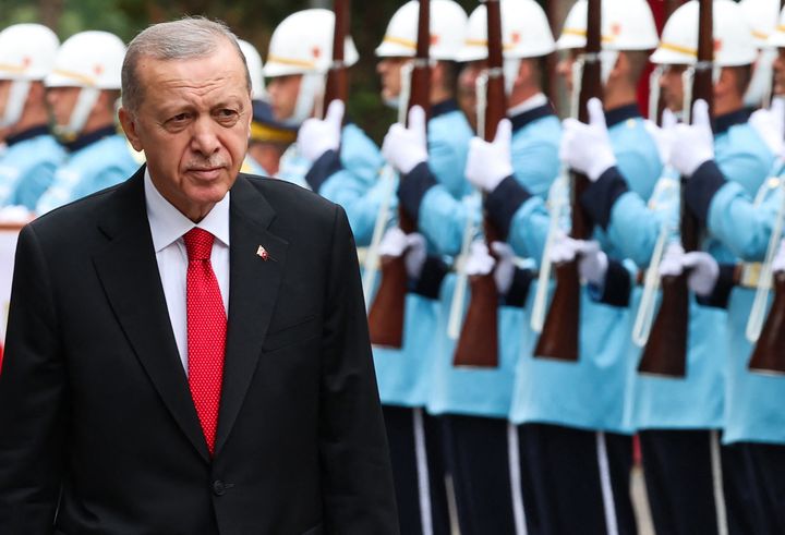 Turkish President Recep Tayyip Erdogan arrives as he is welcomed by an official ceremony ahead of the opening of 28th Term, 2nd Legislative Year of the Turkish Grand National Assembly in Ankara, on October 1, 2023. In his speech in parliament, Erdogan called an attack that occurred near the Interior Ministry “the last stand of terrorism.”
