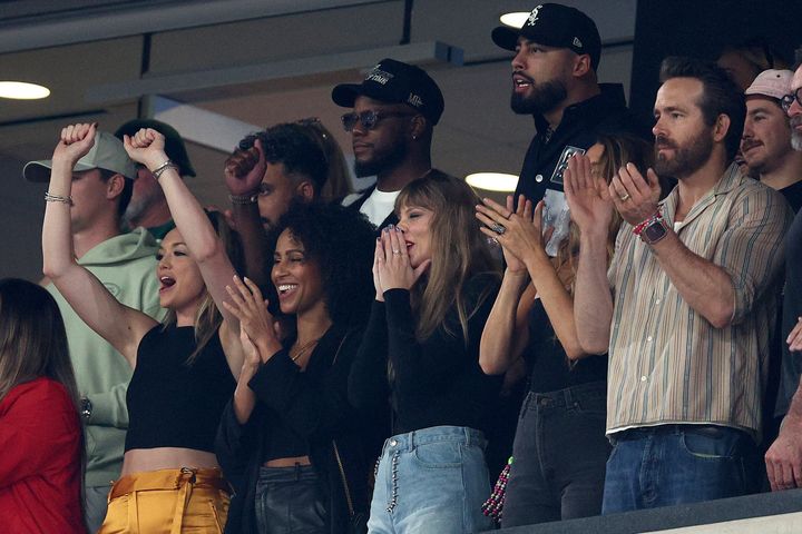 Taylor Swift in a suite at the MetLife Stadium with some of her famous friends