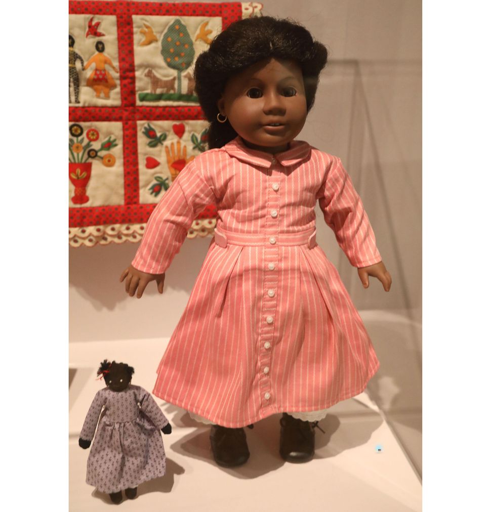 An Addy Walker doll with her doll on display at the New York Historical Society's "Black Dolls" exhibition in 2022.