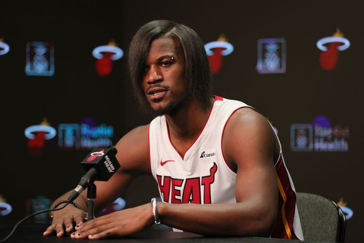 Jimmy Butler #22 of the Miami Heat speaks to reporters Monday. There have been no reports on whether Butler was attending a Jimmy Eats World show afterwards.