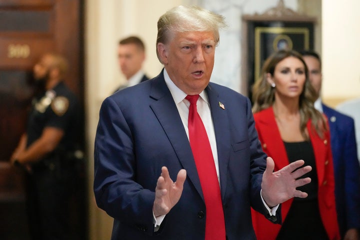 Former President Donald Trump speaks to the media before entering the courtroom at New York Supreme Court, on Oct. 3, 2023, in New York.