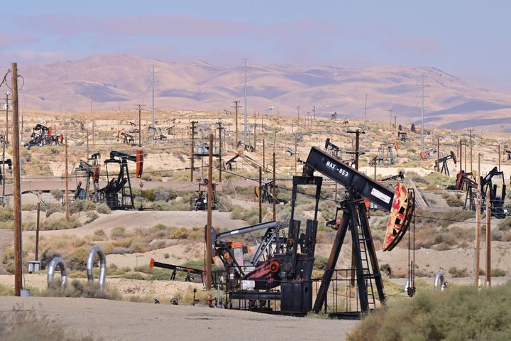 Pumpjacks dot the landscape on oilfields on the outskirts of Taft, Kern County, California, on Sept. 21.