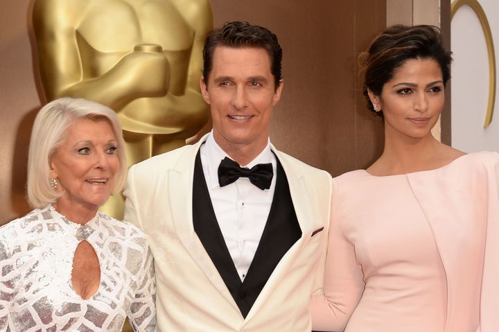 Matthew McConaughey, with mother Mary Kathlene (left) and wife Camila Alves, attends the Oscars on March 2, 2014, in Hollywood.