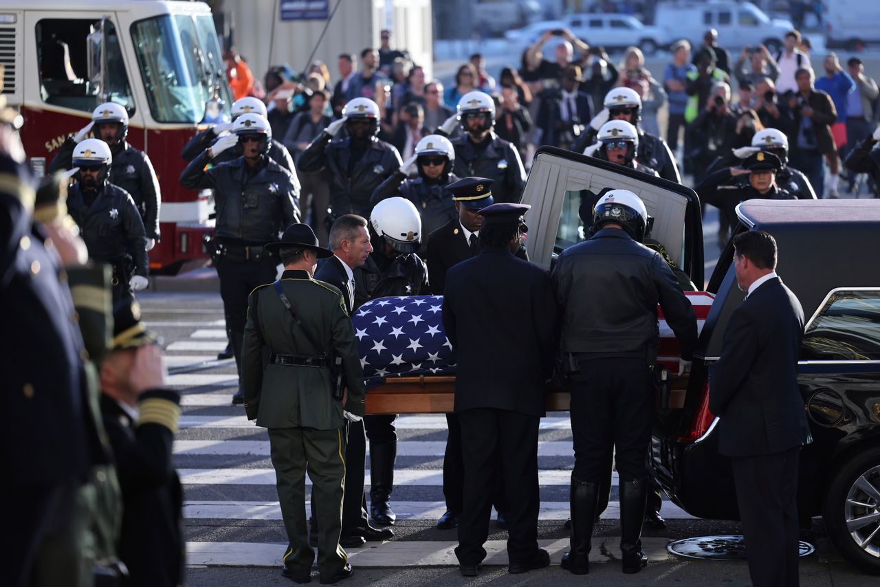 Feinstein's casket is carried from a hearse so mourners can visit San Francisco’s City Hall to say goodbye. It is the building where Feinstein served as a board supervisor and the city's first female mayor before departing for a groundbreaking career in Congress three decades ago.