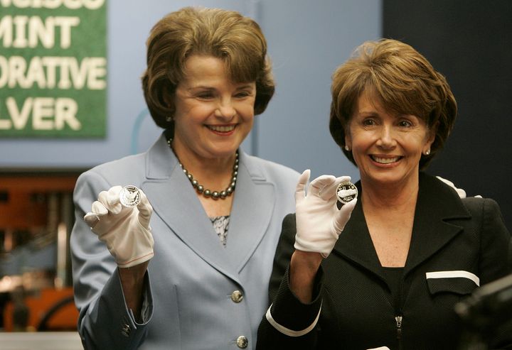 Sen. Dianne Feinstein and Rep. Nancy Pelosi hold up commemorative coins at the U.S. Mint in San Francisco in 2006. The coins were made to fund restoration of the city's old U.S. Mint building.
