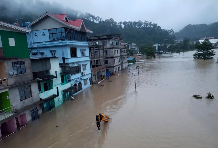 Flood waters inundate buildings along the Teesta river in Sikkim, India, on Oct. 4, 2023. 