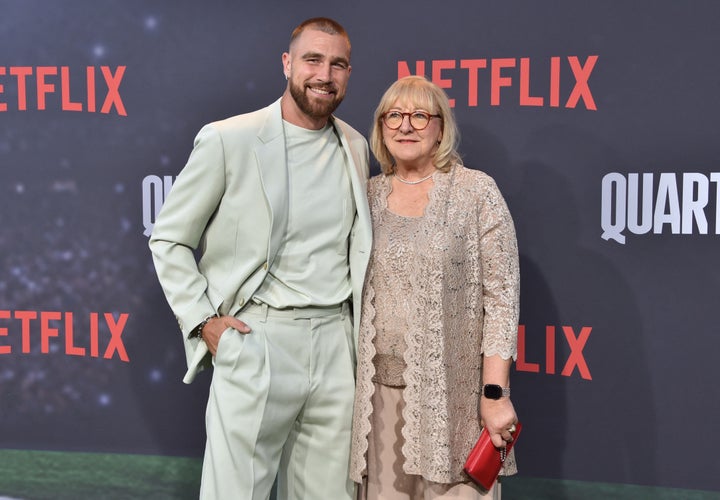 Donna Kelce Shares Her Experience Meeting Taylor Swift Travis Kelce (left) and his mom, Donna Kelce.