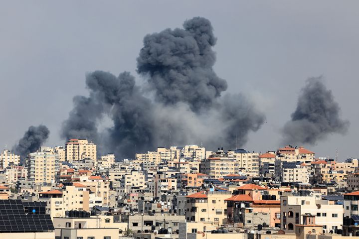 EDITORS NOTE: Graphic content / Smoke rises over Gaza City on October 7, 2023 during Israeli air strike. Palestinian militants have begun a "war" against Israel, the country's defence minister said on October 7 after a barrage of rockets were fired and fighters from the Palestinian enclave infiltrated Israel, a major escalation in the Israeli-Palestinian conflict. (Photo by MAHMUD HAMS / AFP) (Photo by MAHMUD HAMS/AFP via Getty Images)