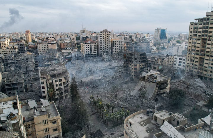 This aerial photo show heavily damaged buildings following Israeli airstrikes in Gaza City on October 10, 2023.