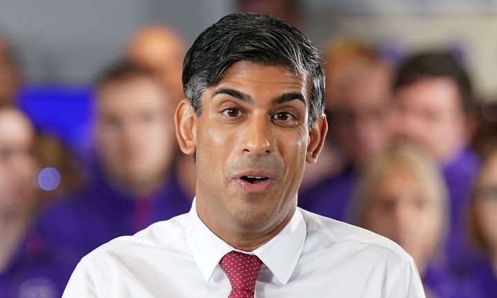 PM Rishi Sunak speaks during a 'PM Connect' event at the Currys Repair Centre in Coddington, eastern England on October 9, 2023.