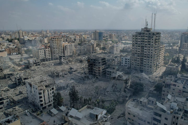 Rubble from buildings hit by an Israeli airstrike is seen Tuesday in Gaza City, the largest city in the Gaza Strip. 