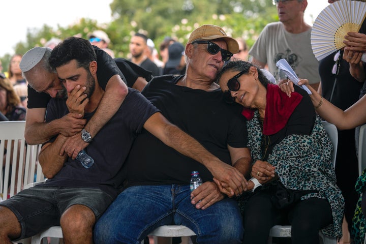 Mourners attend the funeral of May Naim, 24, in Gan Haim, central Israel, Wednesday, Oct. 11, 2023. Naim and at least 260 more Israelis were killed by Hamas militants on Saturday at a rave near Kibbutz Re'im, as the militant Hamas rulers of the Gaza Strip carried out an unprecedented, multi-front attack that killed over 1,000 Israelis. (AP Photo/Francisco Seco)