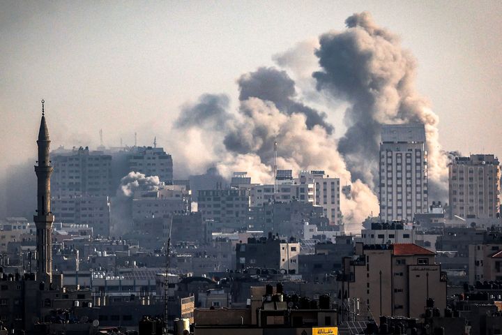 Smoke plumes billow during Israeli air strikes in Gaza City as raging battles between Israel and Hamas continue for the sixth consecutive day. 