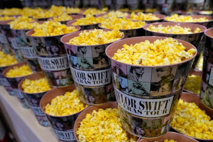 Popcorn in decorative containers is on display prior to the world premiere of the concert film "Taylor Swift: The Eras Tour" on Wednesday, Oct. 11, 2023, at AMC The Grove 14 in Los Angeles. (AP Photo/Chris Pizzello)