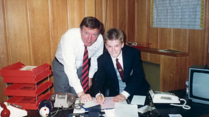 Sir Alex Ferguson (left) and David Beckham after signing with Manchester United.