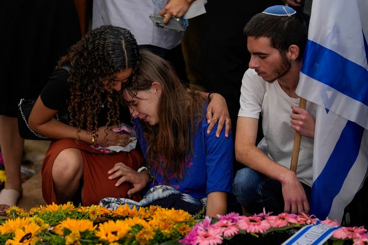 Mourners attend the funeral of Israeli soldier Shilo Rauchberger at the Mount Herzl cemetery in Jerusalem, Israel, on Oct. 12, 2023. 
