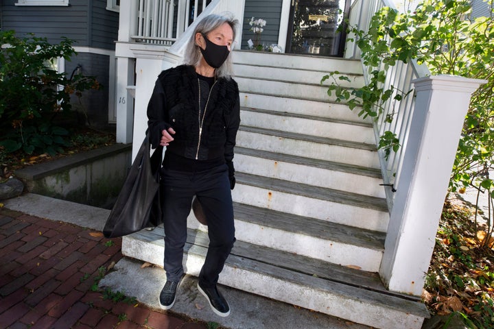 American poet Louise Gluck leaves her home in Cambridge, Mass., Thursday, Oct. 8, 2020.