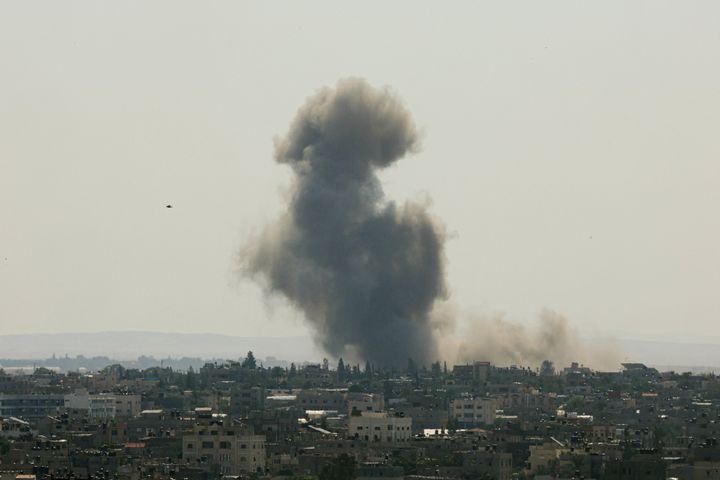 Black smoke billows following an Israeli strike on Rafah, in the southern Gaza Strip.