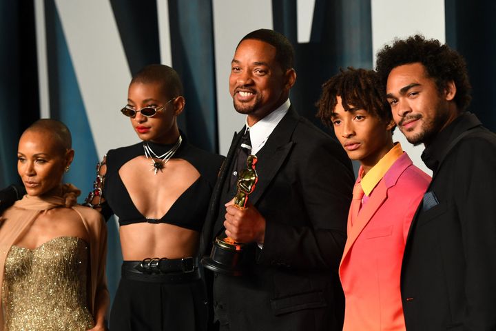 Smith poses with his sons Trey Smith (right) and Jaden Smith, daughter Willow Smith and wife Jada Pinkett Smith, as they attend the 2022 Vanity Fair Oscar Party.