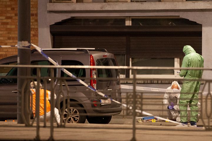 Police and inspectors work in an area where a shooting took place in the center of Brussels, on Oct. 16, 2023.