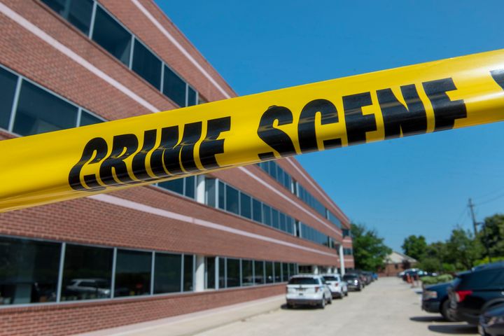 Crime scene tape blocks the Fairfax, Va., office building where police say a man wielding a baseball bat attacked two staffers for U.S. Rep. Gerry Connolly, D-Va., on Monday, May 15, 2023. 