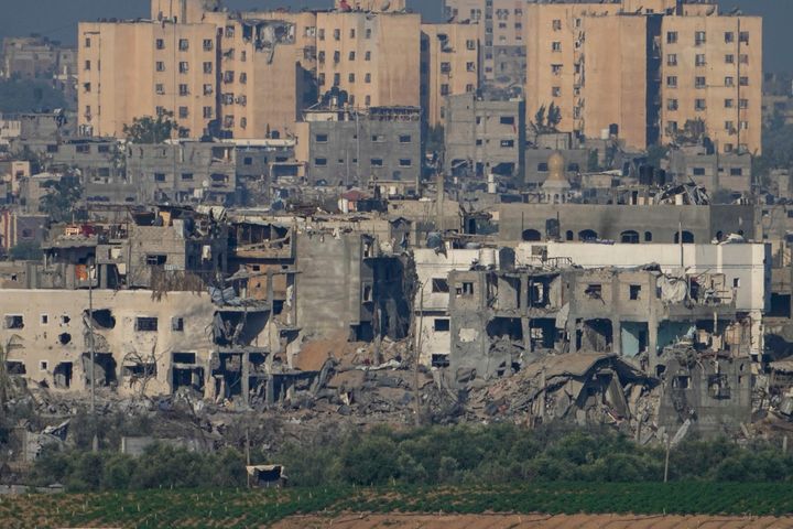 A view of destroyed houses following Israeli strikes in the northern Gaza Strip, as seen from southern Israel, Tuesday, Oct. 17, 2023.
