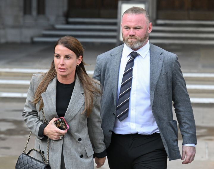 Coleen Rooney and Wayne Rooney outside court