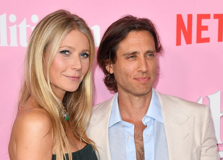 Gwyneth Paltrow, left, and husband Brad Falchuk, right, at the 2019 premiere of The Politician.